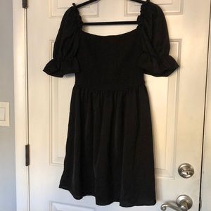 Little black dress with puff sleeves
